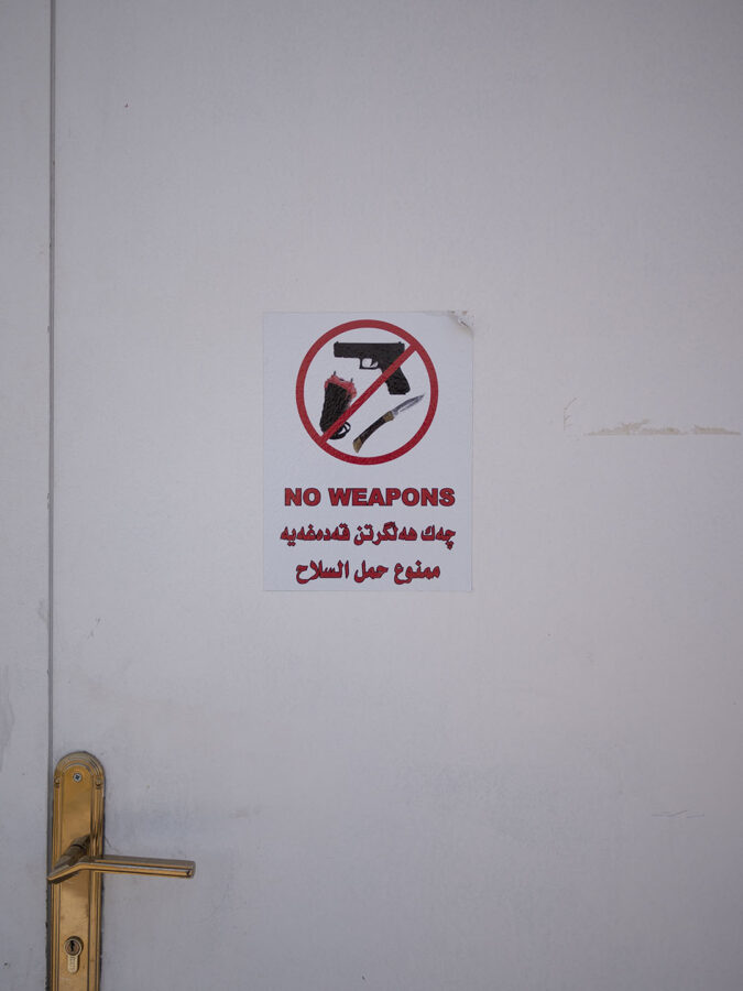 Sign on the door - No weapon